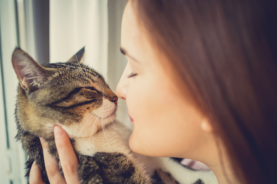 Young woman with cat