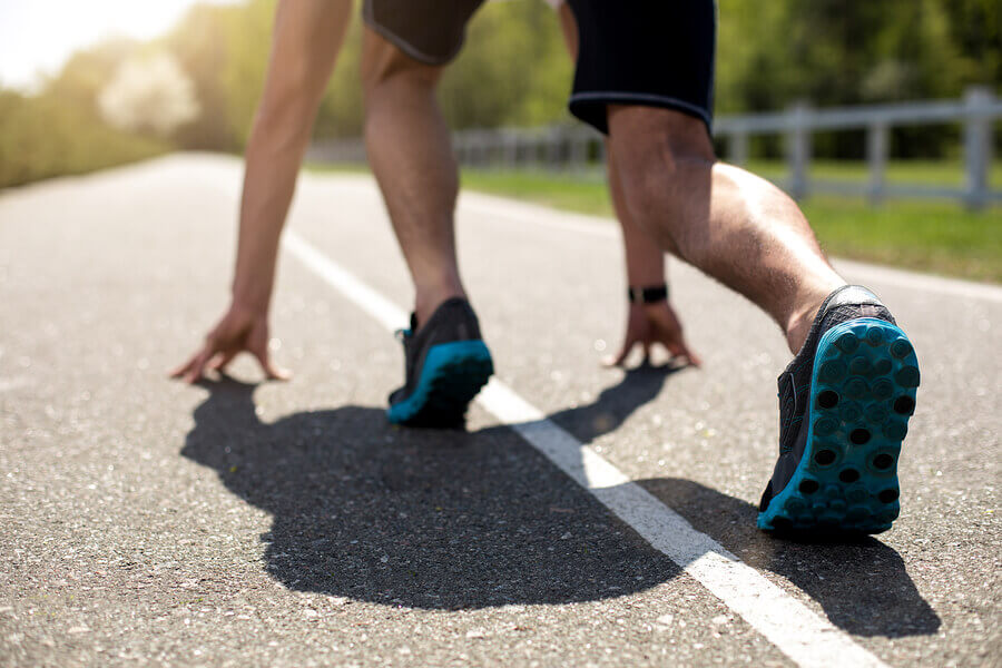 A photo showing a runner about to start a fast race. Much like a website needs to be fast.