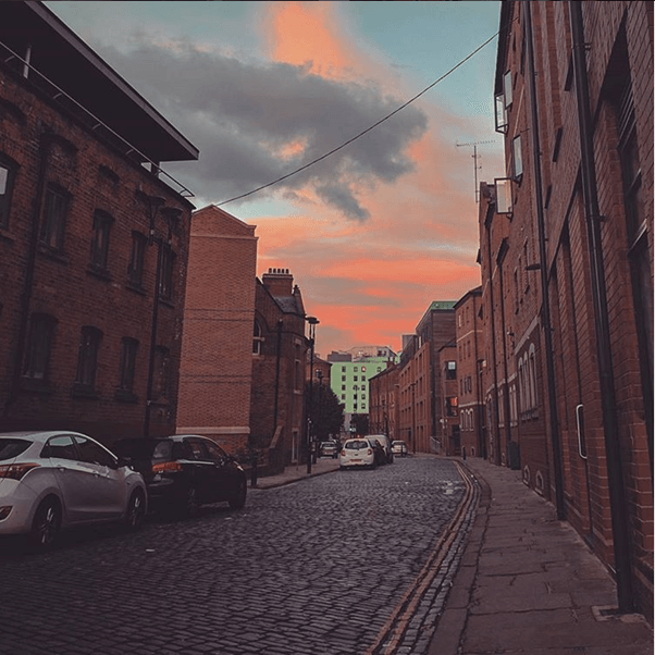 Side street with a blue and orange sky